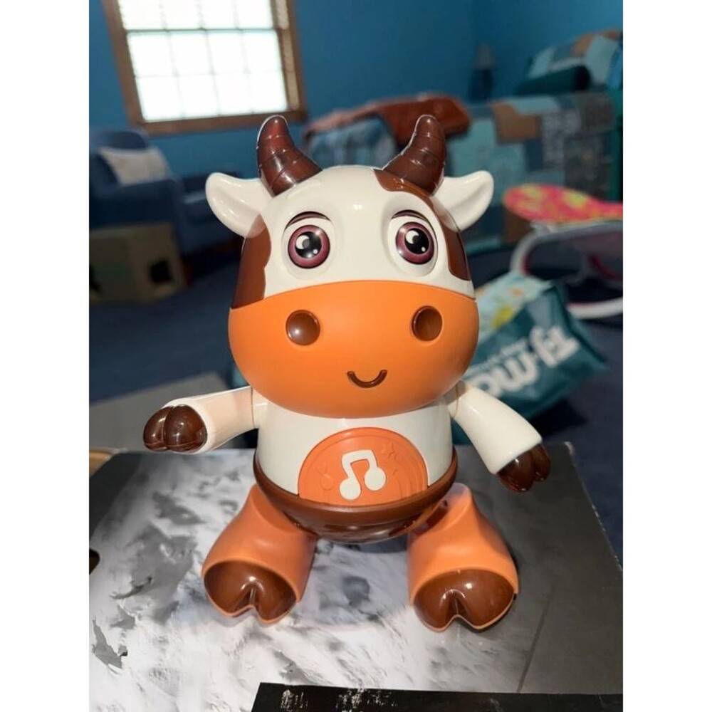 Dancing cow toy